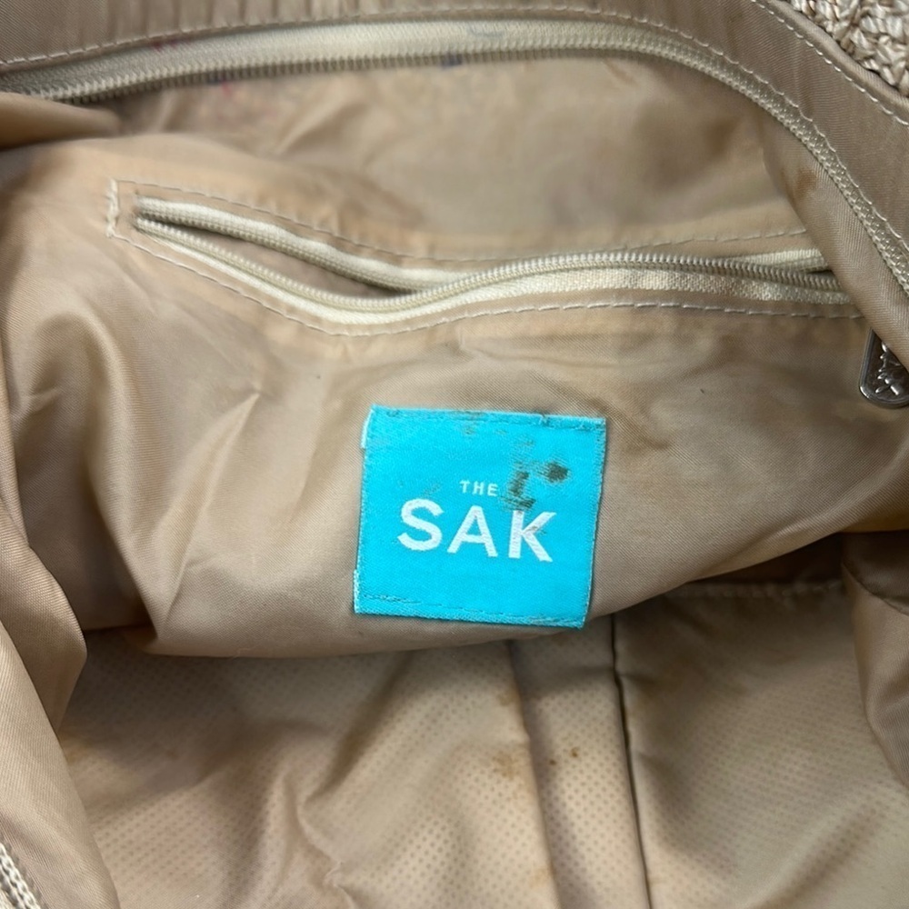 The Sak  crochet Tan Tote Bag with Purple Flower Accent - Picture 8 of 9